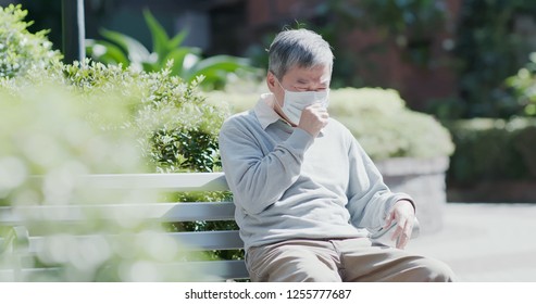 Old Man Wear Mask And Get A Cold And Cough Outdoor 