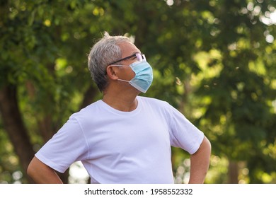 Old Man Wear  Surgical Mask Protect Coronavirus Covid19 At Outdoor City Park Lifestyle New Normal ,Retired Man Exercising In The Morning