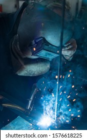 Old Man Welding Steel With Co2 Arc Welder