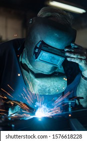 Old Man Welding Steel With Co2 Arc Welder