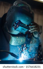 Old Man Welding Steel With Co2 Arc Welder