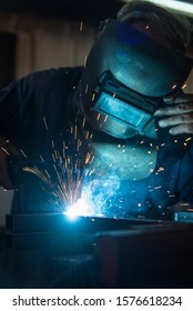 Old Man Welding Steel With Co2 Arc Welder