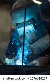 Old Man Welding Steel With Co2 Arc Welder