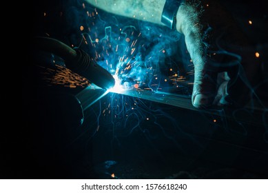 Old Man Welding Steel With Co2 Arc Welder