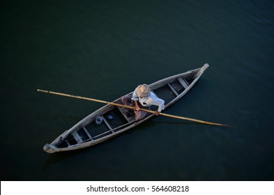 A Old Man Wooden Boat In Mandalay, Myanmar. Wooden Boat In Top View