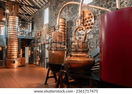 An old Martinique rum distillery, now a museum with copper appliances