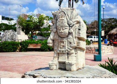 Old Mayan Sculpture At The Streets Of Valladolid Town In Mexico