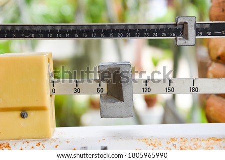 Old measurement tool scales , Measuring machine / Midsection of mid  adjusting balance weight scale