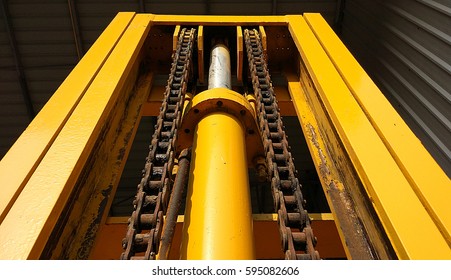 old mechanical chain on a forklift truck - Close up forklift chain and hydraulic