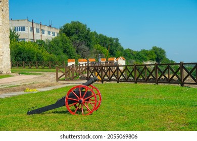 Old Medieval Artillery Canon Before A Brick Wall