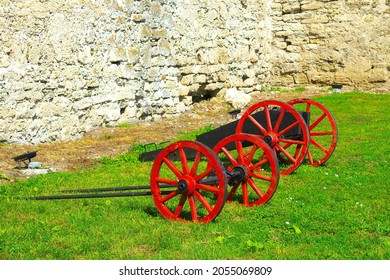 Old Medieval Artillery Canon Before A Brick Wall