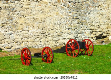 Old Medieval Artillery Canon Before A Brick Wall