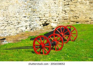 Old Medieval Artillery Canon Before A Brick Wall