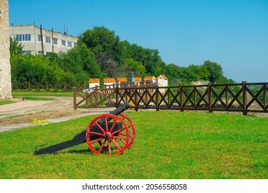 Old Medieval Artillery Canon Before A Brick Wall