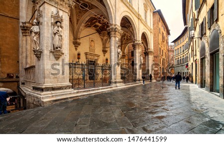 Old medieval streets of Siena, Tuscany, Italy. Siena architecture and landmark. Picturesque streets of Siena, Italy.Travel destination of Italy and Siena. 