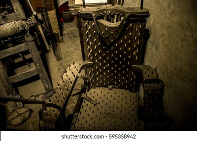 Old Medieval Torture Chamber With Chair And Tools