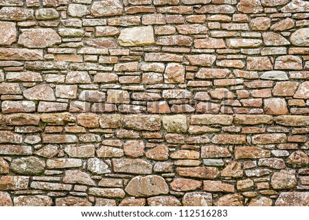 Old medieval wall made from stone