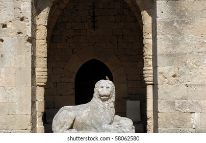 Old Medival Lion In Front Of Door In Archaeological Museum Of Rhodes At Greece.