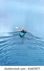 Old Men Kayaking. View From Bridge.