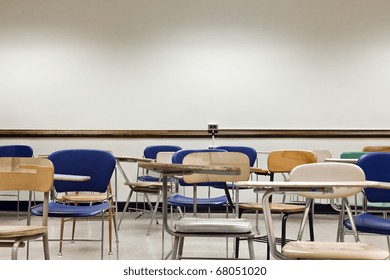 An Old And Messy Classroom Full Of Chairs