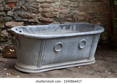 An Old Metal Bathtub No Longer In Use