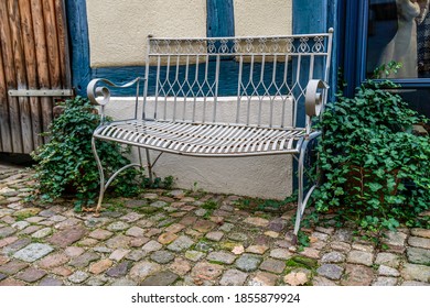 
Old Metal Bench In A Pedestrian Zone