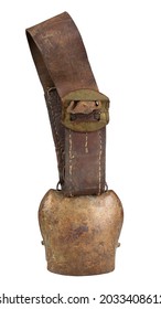 Old metal cowbell on weathered leather belt isolated on white background