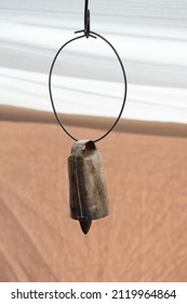 An old metal cowbell used to locate cattle