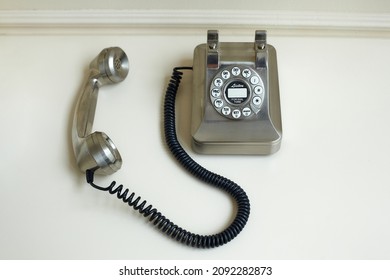 Old Metal Disc Phone With The Handset Removed.