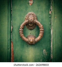 An Old Metal Door Handle Knocker