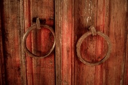 Old Metal Door Handle On The Wooden Door