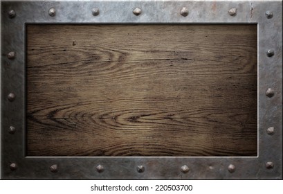 Old Metal Frame Over Wooden Plate