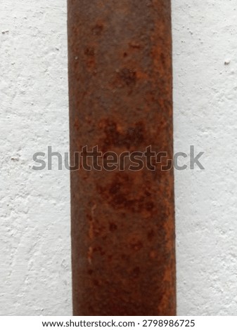 the old metal pipe with texture of rusty corroted.with orange ,brown rist amh rough corroted surface.