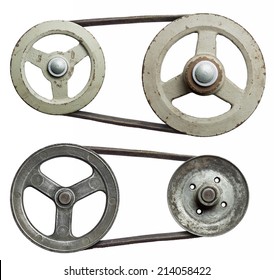 Old metal pulleys with belt.