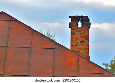 Old Metal Roof With Brick Chimney