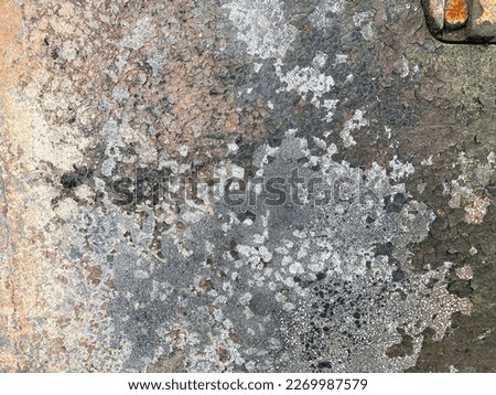 Old Metal Sheet as Background. Abstract of a grunge rusted metal background with rust and oxidized texture. Rusty burnt metal of armored vehicles. metal texture with scratches and cracks.