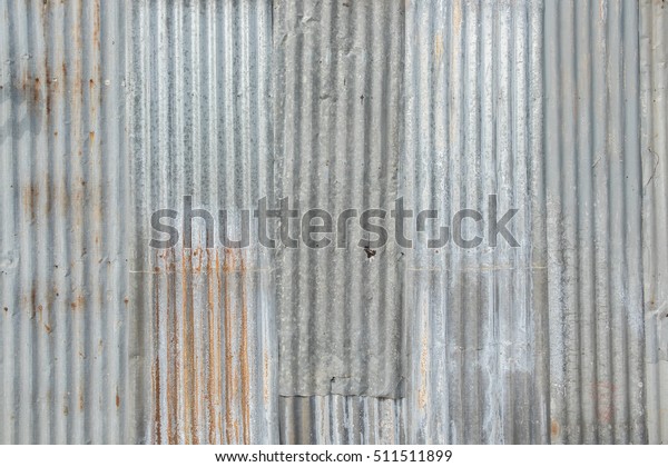 Old metal sheet roof\
texture. Pattern of old metal sheet. Metal sheet texture. Rusty\
metal sheet texture.