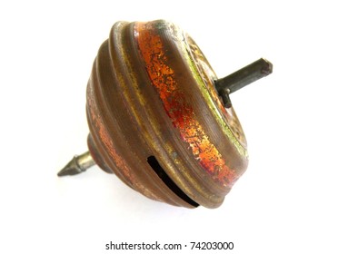 Old Metal Spinning Top With Nail Through The Center And J.P. In The Design.