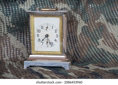 Old Metal Table Clock With Some Rust And Three Spheres