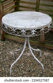 An Old Metal Table At An English Country Pub