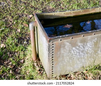 An Old Metal Trough In The British Countryside