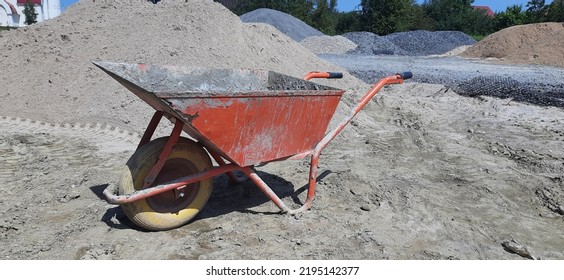 Old Dirty Garden Metal Wheelbarrow Cart, Used Gardening Tool Equipment Side View. Agriculture Cart Wheel Farm, Flat Lawn Ground Supplies, Garden Trolley, Handcart With Wheel