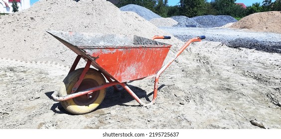 Old Dirty Garden Metal Wheelbarrow Cart, Used Gardening Tool Equipment Side View. Agriculture Cart Wheel Farm, Flat Lawn Ground Supplies, Garden Trolley, Handcart With Wheel