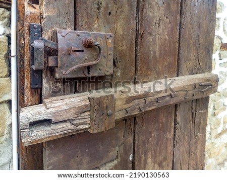 Old metal and wood lock of a wooden door. Close up ストックフォト © 