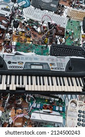 Old microcircuits, telephones, keyboards, wires, disks and synthesizer. Riga, Latvia, december 2021
