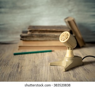 Old microphone on a table