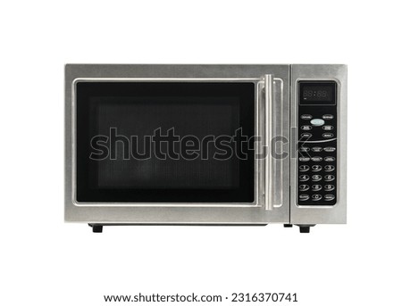 Old microwave oven isolated with cut out background.