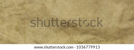 Old Military Army Faded Camouflage Fabric Backpack Or Bag Or Uniform Horizontal Background Or Rough Texture Close-up Top View