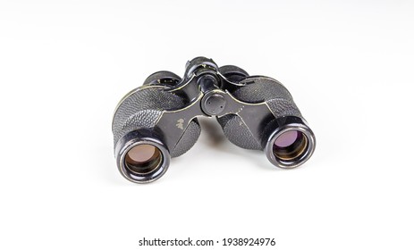 Old military binoculars close-up. Soft focus