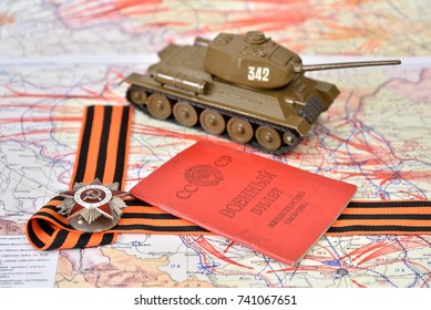 Old military card of the USSR , order of the Patriotic War in St. George's bow and model of the T-34 are on the map of the liberation of Poland